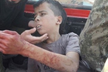 الطفل عبد الله عيسى قبيل ذبحه من قبل ارهابيي حركة" نور الدين الزنكي" في مخيم حندرات في ريف حلب الشمالي
