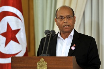 Tunisian President Moncef Marzouki delivers a speech during a ceremony marking International Human Rights Day in Tunis on December 8, 2012. Marzouki paid tribute to those who fought against ousted dictator Zine El Abidine Ben Ali. AFP PHOTO / FETHI BELAID