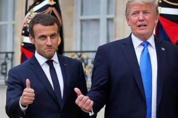 الفرنسي إيمانويل ماكرون والرئيس الأمريكي دونالد ترامب بعد المؤتمر الصحفي المشترك في قصر الإليزيه بباريس في فرنسا يوم الخميس. تصوير ستيفين ماه - رويترز.