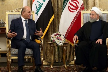 الرئيس الايراني حسن روحاني يستقبل نظيره العراقي برهم صالح