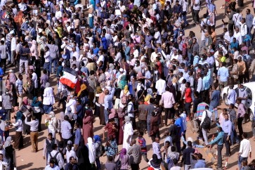 Sudanese demonstrators chant slogans as they march along the street during anti-government protests in Khartoum, Sudan December 25, 2018. REUTERS/Mohamed Nureldin Abdallah