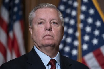 Sen. Lindsey Graham, R-S.C., the ranking member of the Senate Budget Committee, waits to speak to reporters following bi-partisan passage of the Ending Forced Arbitration of Sexual Assault and Sexual Harassment Act, at the Capitol in Washington, Thursday, Feb. 10, 2022. (AP Photo/J. Scott Applewhite)