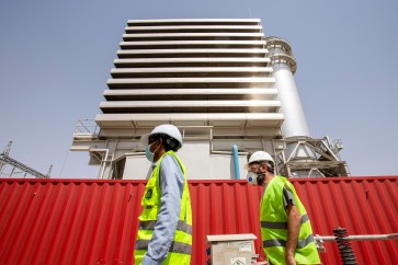 Technicians tour the premises of the power plant in the southern Iraqi city of Samawah on June 16, 2020. (Photo by Hussein FALEH / AFP) (Photo by HUSSEIN FALEH/AFP via Getty Images)