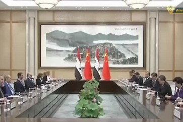 لقاء بين الرئيس الصيني ونظيره السوري في بكين